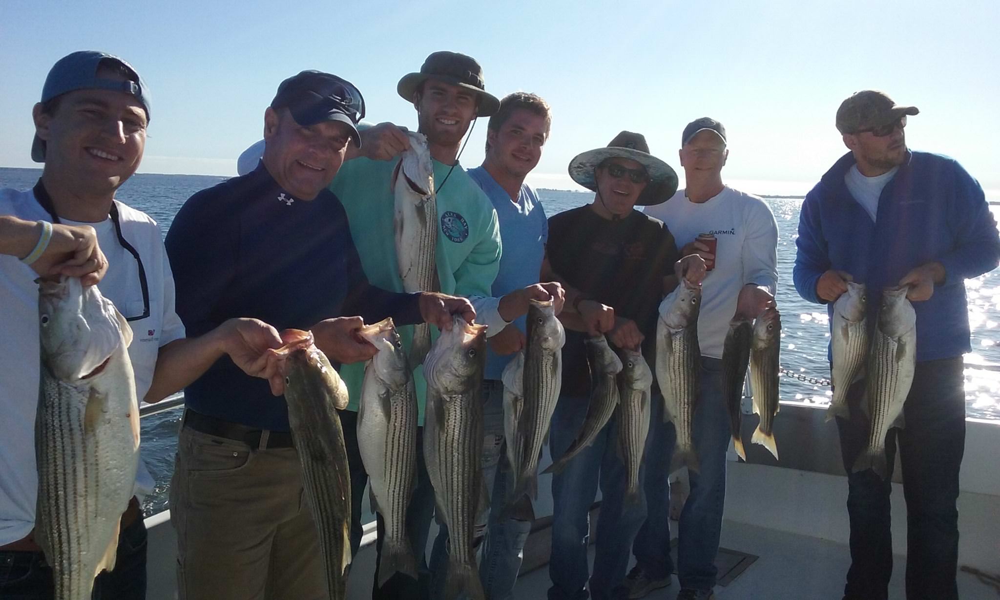 Another Happy Crew With A Limit Of Maryland Rockfish!